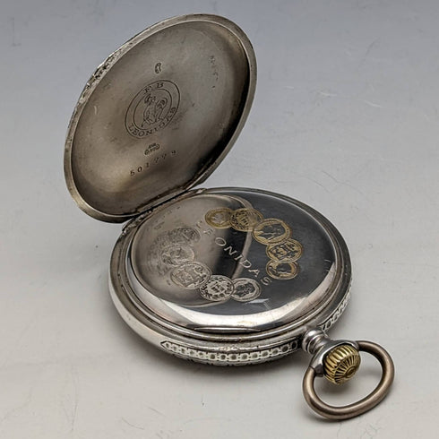 Swiss made antique Leonidas pocket watch flower sculpture silver side hunter case works well